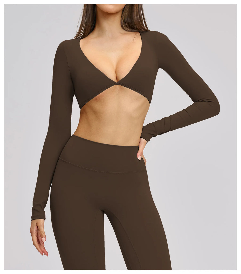 Brown long-sleeve top and leggings set on a plain background