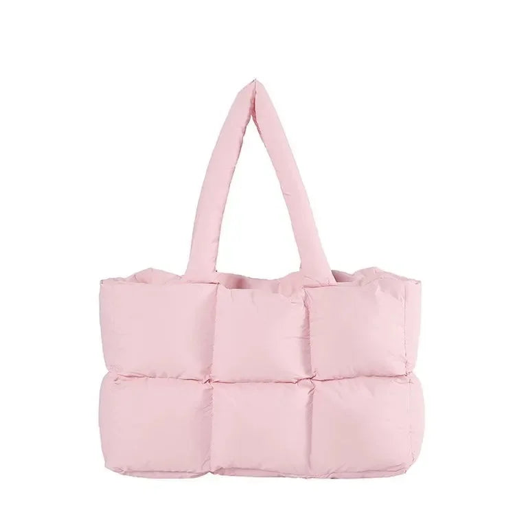 Pink puffer tote bag on a white background