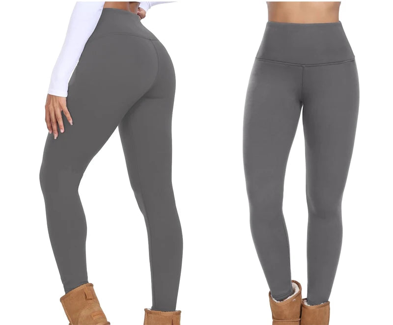 Gray leggings worn by a person on a white background