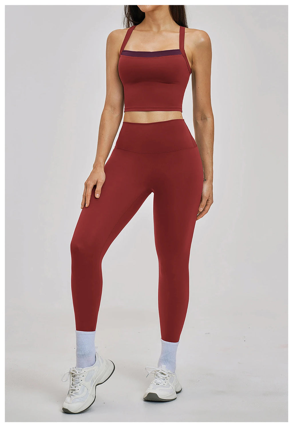 Person wearing a red athletic outfit on a white background