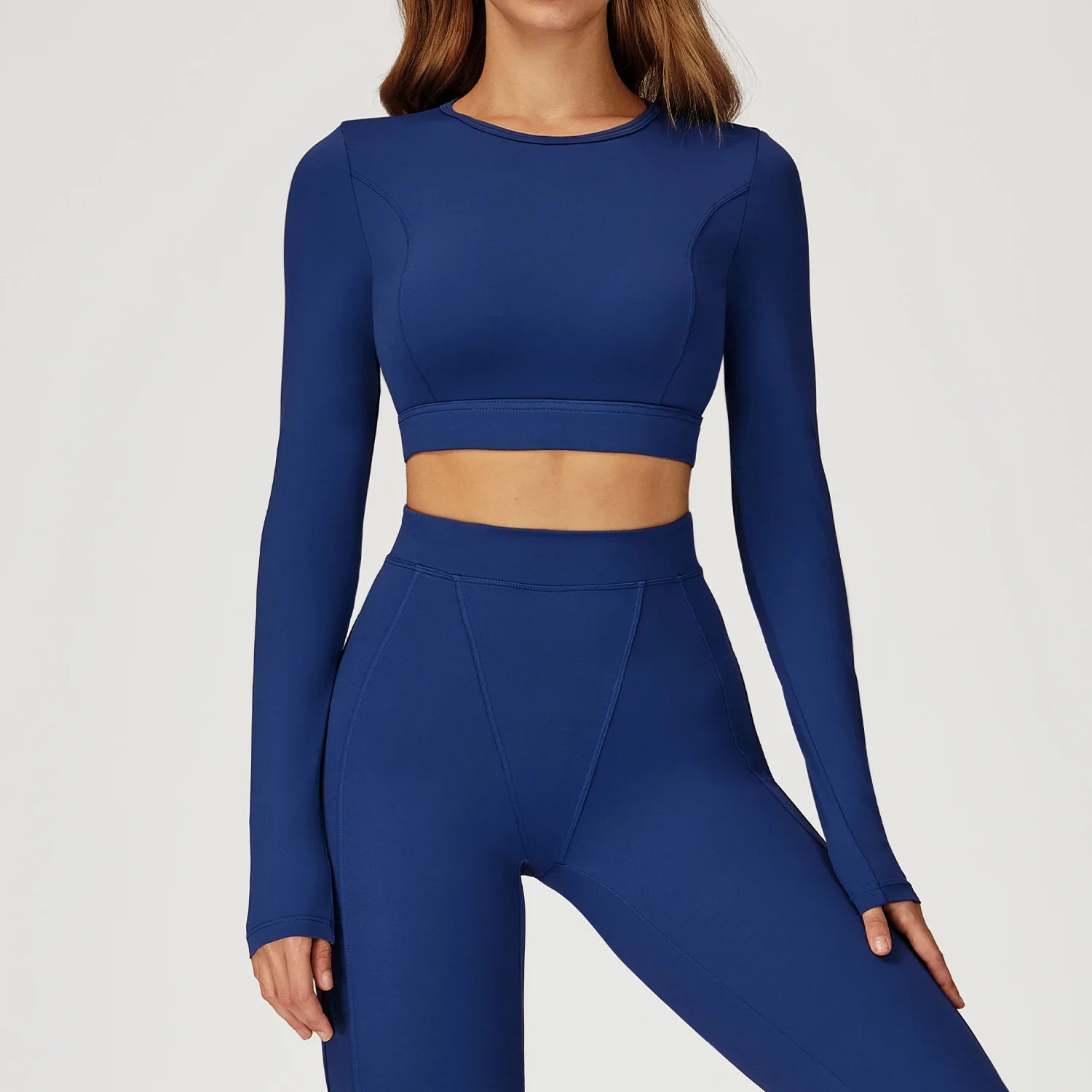 Person wearing a blue athletic outfit on a white background