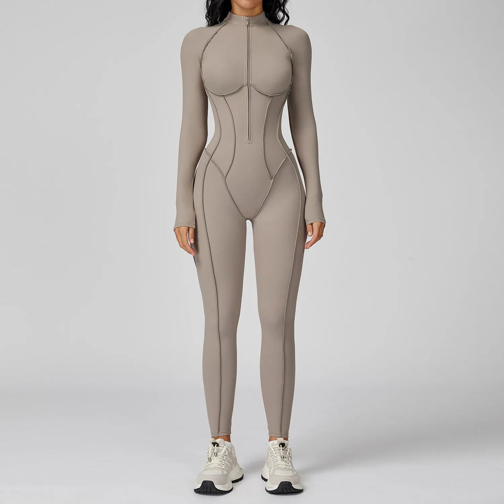 Beige bodysuit worn by a model on a white background