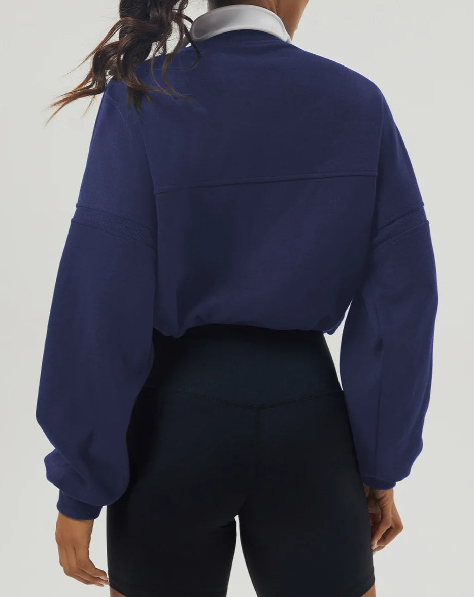 Person wearing a blue jacket on a white background