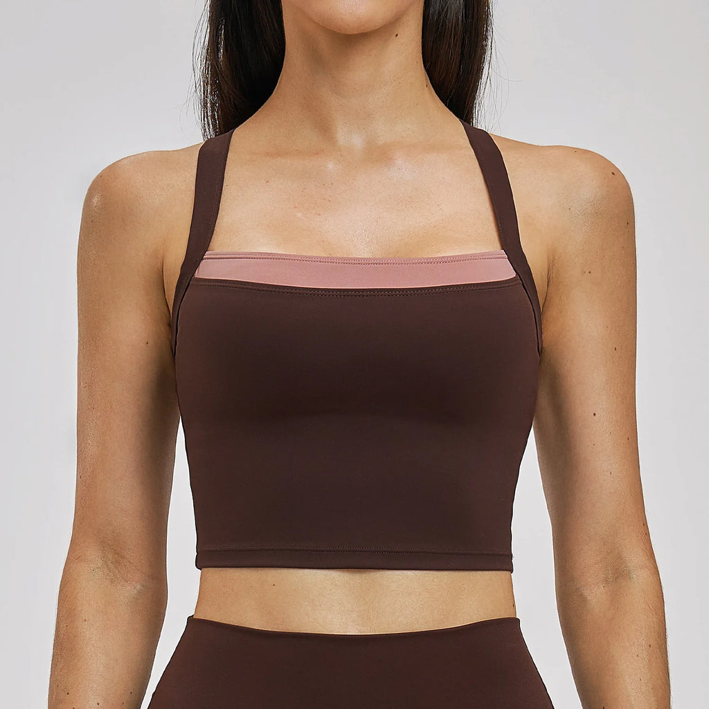 Brown sports bra worn by a person on a plain background